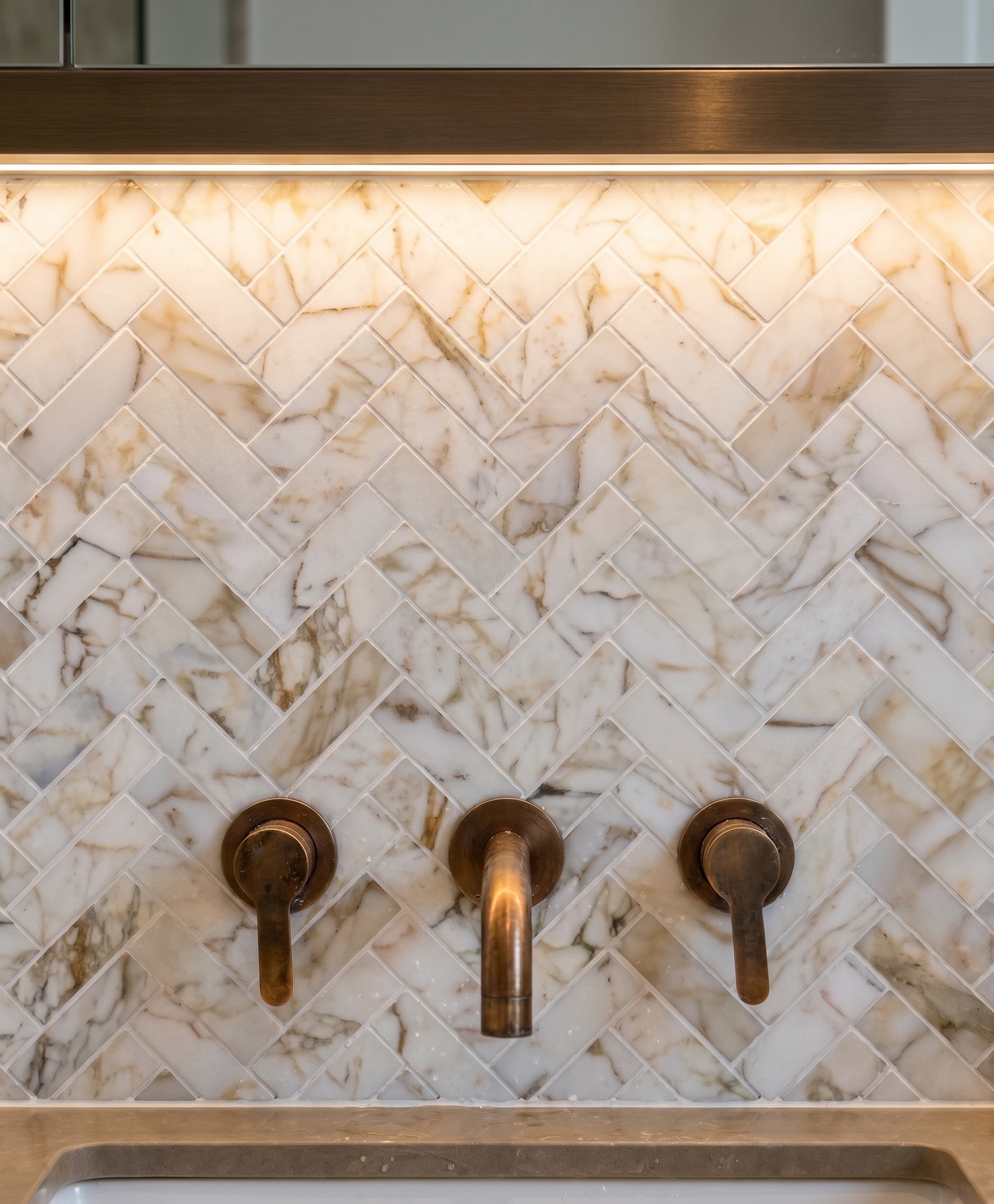 Calacatta Oro Marble Honed Herringbone Mosaic