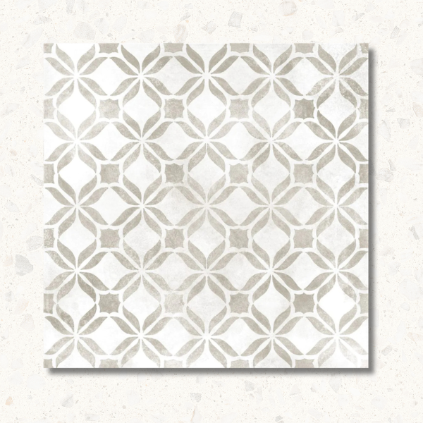 Decorative tile with geometric pattern on a textured white background